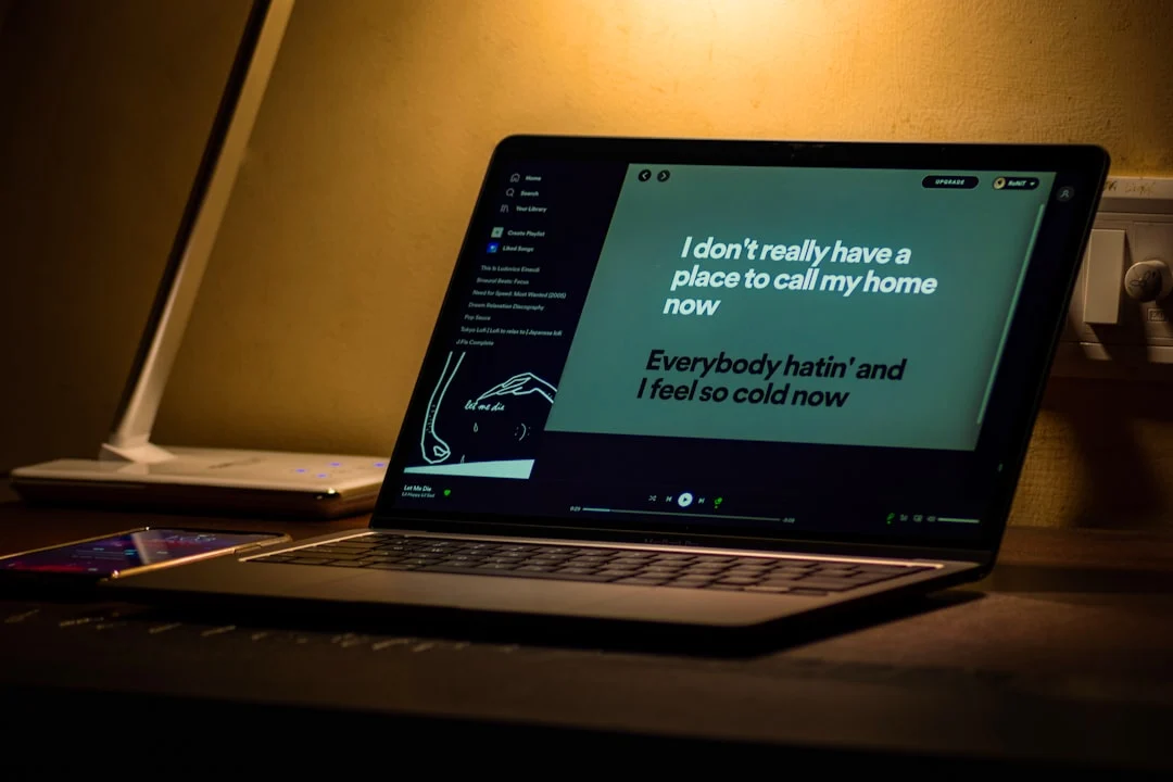 Key Secrets to a WordPress Website Design That Wows Your Visitors A skilled WordPress Website Designer crafting a user-centric website on a laptop, with a thought bubble showing analytics and customer journey - Ahsan Mushtaq Professional Web Design & Developer